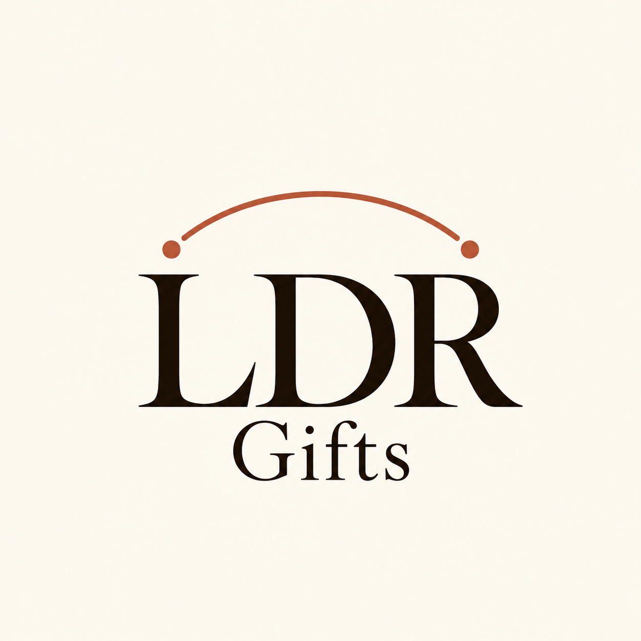 LDR Gifts logo with large dark serif “LDR” lettering, “Gifts” centered below, and a terracotta curved line with two dots above on a warm cream background.